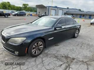 2012 BMW 7 Series 740Li with VIN WBAKB4C53CC577042, listed as a Copart auction lot 67771675 with 134,910 mi miles and Salvage title. Bid and sale history available at DreamBid. Image 1.