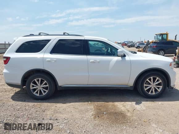 2016 Dodge Durango Limited with VIN 1C4RDHDG8GC432779, listed as a IAAI auction lot 42954792 with 137,086 mi miles and . Bid and sale history available at DreamBid. Image 13.