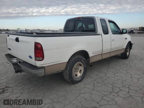 1997 Ford F-150 с VIN 1FTDX17W0VNB72214, выставлен на аукционе Copart как лот 87294095 с пробегом 309 147 миль миль и Чистый • Clean title. История ставок и продаж доступна на DreamBid. Изображение 3.