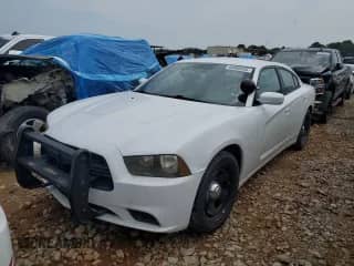 2012 Dodge Charger Police с VIN 2C3CDXAG2CH159922, выставлен на аукционе Copart как лот 66906655 с пробегом 157 196 миль миль и Списание • Salvage title. История ставок и продаж доступна на DreamBid. Изображение 1.