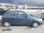 2010 Hyundai Accent GS z VIN KMHCM3AC3AU180348, wystawiony jako IAAI lot #41735911 z przebiegiem 151 946 mil mil oraz . Historia ofert i sprzedaży dostępna na DreamBid. Obrazek 13.