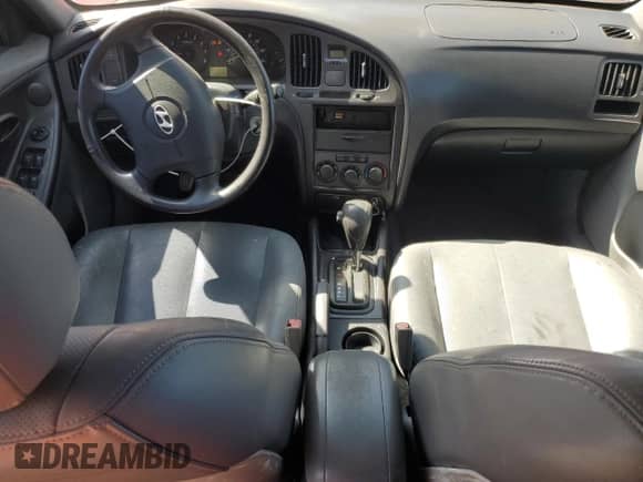 2004 Hyundai Elantra GT z VIN KMHDN56D14U109930, wystawiony jako Copart lot #65430945 z przebiegiem 74 504 mil mil oraz Szkoda całkowita • Salvage title. Historia ofert i sprzedaży dostępna na DreamBid. Obrazek 8.