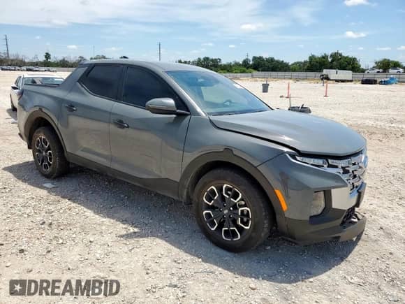 2024 Hyundai Santa Cruz SEL with VIN 5NTJBDDE8RH109075, listed as a Copart auction lot 66052415 with 21,695 mi miles and Salvage title. Bid and sale history available at DreamBid. Image 4.