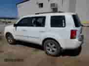 2010 Honda Pilot EX with VIN 5FNYF3H45AB019611, listed as a Copart auction lot 64311855 with 183,238 mi miles and Salvage title. Bid and sale history available at DreamBid. Image 2.