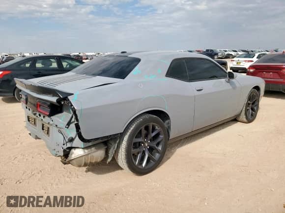 2020 Dodge Challenger SXT with VIN 2C3CDZAG3LH218990, listed as a Copart auction lot 81957265 with 59,129 mi miles and Salvage title. Bid and sale history available at DreamBid. Image 3.