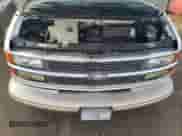 2002 Chevrolet Express z VIN 1GBFG15R721227867, wystawiony jako Copart lot #78621624 z przebiegiem 165 856 mil mil oraz Czysty tytuł • Clean title. Historia ofert i sprzedaży dostępna na DreamBid. Obrazek 12.