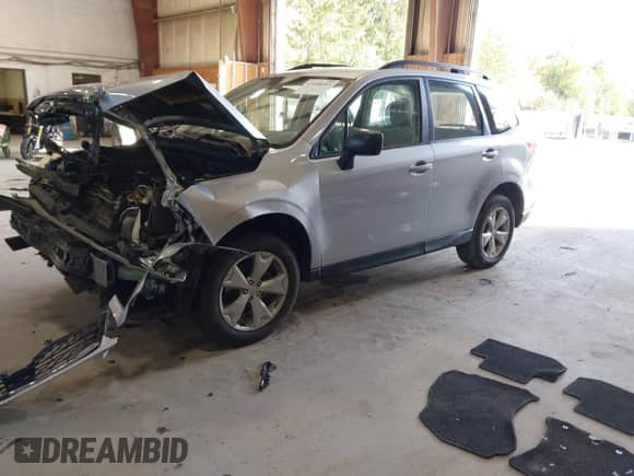 2016 Subaru Forester 2.5i z VIN JF2SJABC6GH501118, wystawiony jako IAAI lot #43408683 z przebiegiem 104 586 mil mil oraz . Historia ofert i sprzedaży dostępna na DreamBid. Obrazek 2.