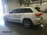 2012 Jeep Grand Cherokee SRT-8 z VIN 1C4RJFDJ2CC105829, wystawiony jako Copart lot #51840385 z przebiegiem 142 146 mil mil oraz Czysty tytuł • Clean title. Historia ofert i sprzedaży dostępna na DreamBid. Obrazek 2.