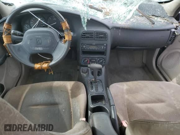 2000 Saturn SL with VIN 1G8ZH5284YZ220128, listed as a Copart auction lot 73846764 with 134,478 mi miles and Non repairable. Bid and sale history available at DreamBid. Image 8.