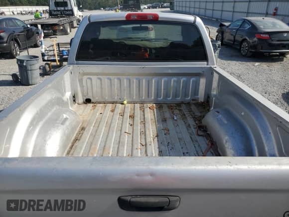 2003 Dodge 1500 ST with VIN 1D7HA16K23J602093, listed as a Copart auction lot 81409815 with 148,065 mi miles and Salvage title. Bid and sale history available at DreamBid. Image 10.