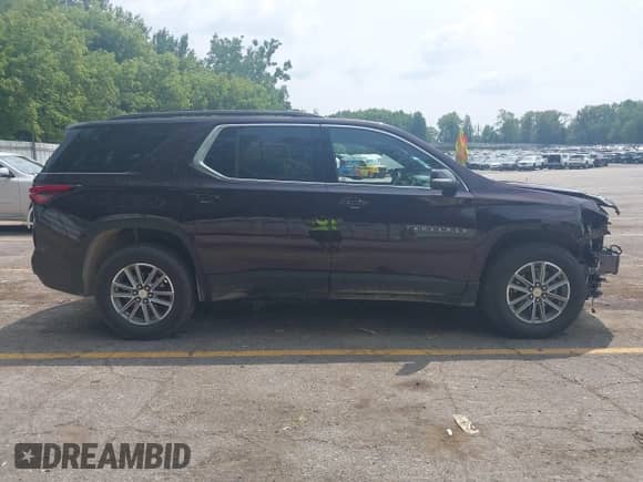 2023 Chevrolet Traverse LT with VIN 1GNERHKW4PJ152998, listed as a IAAI auction lot 42907578 with 28,803 mi miles and . Bid and sale history available at DreamBid. Image 13.