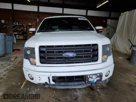 2014 Ford F-150 с VIN 1FTMF1ET9EFB26614, выставлен на аукционе Copart как лот 69219105 с пробегом 144 074 миль миль и Списание • Salvage title. История ставок и продаж доступна на DreamBid. Изображение 5.