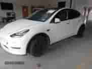 2020 Tesla Model Y Long Range with VIN 5YJYGDEE1LF012853, listed as a IAAI auction lot 42289499 with 99,236 mi miles and . Bid and sale history available at DreamBid. Image 20.