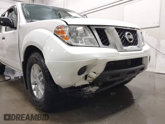 2019 Nissan Frontier SV z VIN 1N6AD0EV5KN773448, wystawiony jako IAAI lot #41611922 z przebiegiem 77 010 mil mil oraz . Historia ofert i sprzedaży dostępna na DreamBid. Obrazek 6.