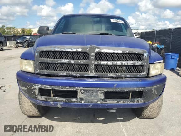 1998 Dodge 1500 z VIN 1B7HF13Z6WJ191072, wystawiony jako Copart lot #61568405 z przebiegiem 199 634 mil mil oraz Szkoda całkowita • Salvage title. Historia ofert i sprzedaży dostępna na DreamBid. Obrazek 5.