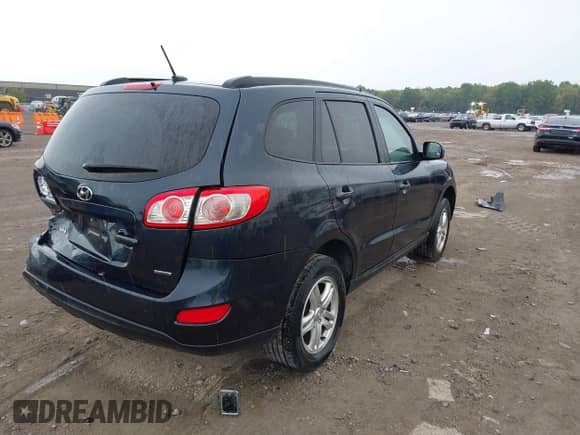 2012 Hyundai Santa Fe GLS с VIN 5XYZGDAB6CG126033, выставлен на аукционе IAAI как лот 43261351 с пробегом 166 055 миль миль и . История ставок и продаж доступна на DreamBid. Изображение 4.