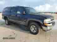 2001 Chevrolet Suburban LT with VIN 3GNGC26U21G119300, listed as a Copart auction lot 68131044 with 147,430 mi miles and Salvage title. Bid and sale history available at DreamBid. Image 4.