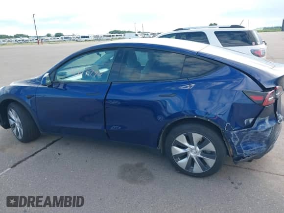 2021 Tesla Model Y Long Range with VIN 5YJYGDEE8MF187196, listed as a IAAI auction lot 42615790 with 89,810 mi miles and . Bid and sale history available at DreamBid. Image 13.