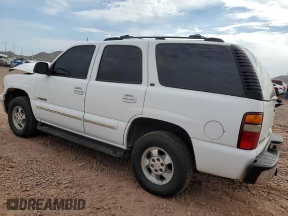 2003 Chevrolet Tahoe LS with VIN 1GNEC13Z63R109194, listed as a Copart auction lot 70428045 with 228,461 mi miles and Salvage title. Bid and sale history available at DreamBid. Image 2.
