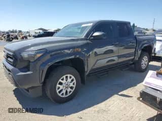 2024 Toyota Tacoma SR with VIN 3TYKD5HN9RT004802, listed as a Copart auction lot 67269115 with 26,288 mi miles and Salvage title. Bid and sale history available at DreamBid. Image 1.