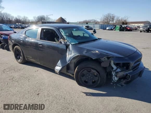 2007 Dodge Charger Police z VIN 2B3KA43H27H673300, wystawiony jako Copart lot #47159105 z przebiegiem 106 794 mil mil oraz Szkoda całkowita • Salvage title. Historia ofert i sprzedaży dostępna na DreamBid. Obrazek 4.