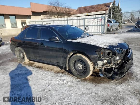 2012 Chevrolet Impala Police Police with VIN 2G1WD5E30C1159889, listed as a Copart auction lot 44511175 with 122,914 mi miles and Salvage title. Bid and sale history available at DreamBid. Image 4.