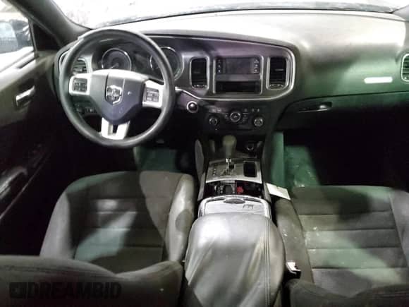 2013 Dodge Charger SE z VIN 2C3CDXBG0DH528454, wystawiony jako Copart lot #84697974 z przebiegiem 217 316 mil mil oraz Szkoda całkowita • Salvage title. Historia ofert i sprzedaży dostępna na DreamBid. Obrazek 8.