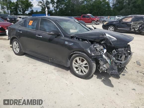 2018 Kia Optima LX с VIN 5XXGT4L36JG234811, выставлен на аукционе Copart как лот 52391915 с пробегом 142 293 миль миль и Списание • Salvage title. История ставок и продаж доступна на DreamBid. Изображение 4.