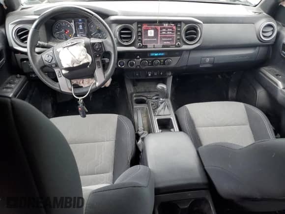 2021 Toyota Tacoma SR with VIN 3TMCZ5AN5MM418762, listed as a Copart auction lot 66169995 with 73,465 mi miles and Salvage title. Bid and sale history available at DreamBid. Image 8.