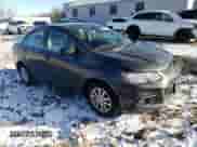 2018 Chevrolet Sonic LT with VIN 1G1JD5SB2J4120874, listed as a Copart auction lot 87215134 with 32,298 mi miles and Salvage title. Bid and sale history available at DreamBid. Image 4.