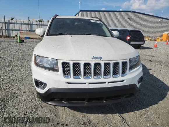 2016 Jeep Compass Latitude with VIN 1C4NJCEA7GD777378, listed as a Copart auction lot 56390385 with 123,186 mi miles and Salvage title. Bid and sale history available at DreamBid. Image 5.