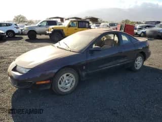 1999 Saturn SC с VIN 1G8ZR1274XZ262181, выставлен на аукционе Copart как лот 75931774 с пробегом Не указан миль и Списание • Salvage title. История ставок и продаж доступна на DreamBid. Изображение 1.