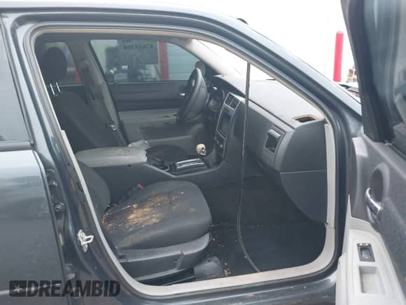 2007 Dodge Charger Police z VIN 2B3KA43H67H770774, wystawiony jako IAAI lot #42618360 z przebiegiem 165 711 mil mil oraz . Historia ofert i sprzedaży dostępna na DreamBid. Obrazek 5.