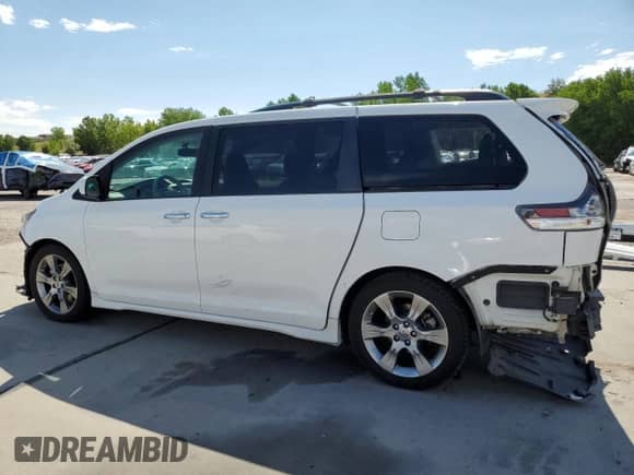 2013 Toyota Sienna SE with VIN 5TDXK3DC5DS394290, listed as a Copart auction lot 64800965 with 149,374 mi miles and Salvage title. Bid and sale history available at DreamBid. Image 2.
