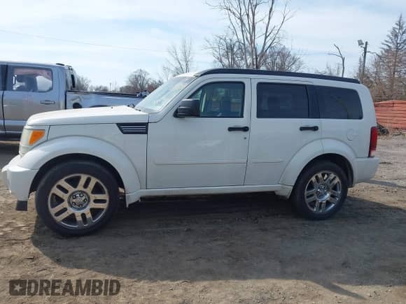 2007 Dodge Nitro R/T with VIN 1D8GU58687W720700, listed as a IAAI auction lot 41802485 with 203,575 mi miles and . Bid and sale history available at DreamBid. Image 14.