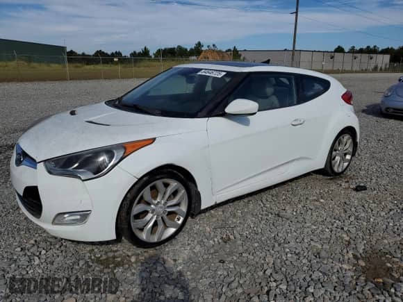 2012 Hyundai Veloster w/Gray Int z VIN KMHTC6AD0CU056764, wystawiony jako Copart lot #84646725 z przebiegiem 157 456 mil mil oraz Czysty tytuł • Clean title. Historia ofert i sprzedaży dostępna na DreamBid. Obrazek 1.