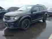2015 Dodge Journey R/T with VIN 3C4PDDEG1FT693527, listed as a IAAI auction lot 43292719 with 261,215 mi miles and . Bid and sale history available at DreamBid. Image 2.