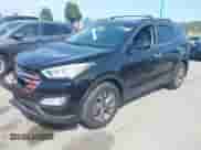 2015 Hyundai Santa Fe z VIN 5XYZU3LB0FG284923, wystawiony jako IAAI lot #43246696 z przebiegiem 96 991 mil mil oraz . Historia ofert i sprzedaży dostępna na DreamBid. Obrazek 18.