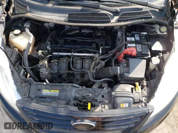 2012 Ford Fiesta S with VIN 3FADP4AJ8CM121345, listed as a Copart auction lot 70723125 with 113,935 mi miles and Salvage title. Bid and sale history available at DreamBid. Image 11.