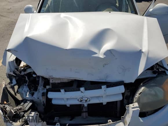 2003 Hyundai Accent GL z VIN KMHCG45C73U427901, wystawiony jako Copart lot #63874575 z przebiegiem 134 268 mil mil oraz Szkoda całkowita • Salvage title. Historia ofert i sprzedaży dostępna na DreamBid. Obrazek 11.