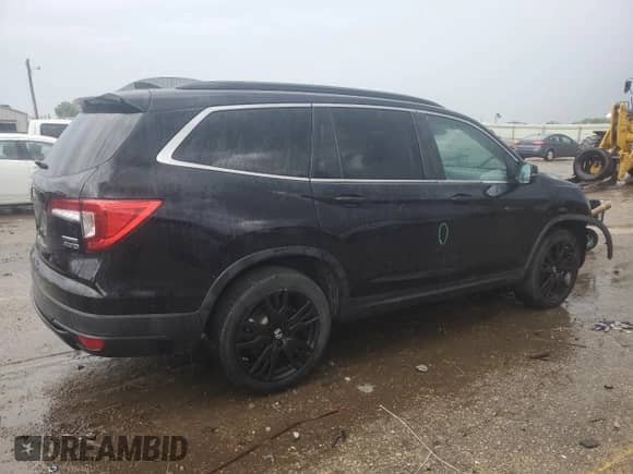 2022 Honda Pilot Special Edition with VIN 5FNYF6H29NB001957, listed as a Copart auction lot 60894795 with 65,448 mi miles and Salvage title. Bid and sale history available at DreamBid. Image 3.