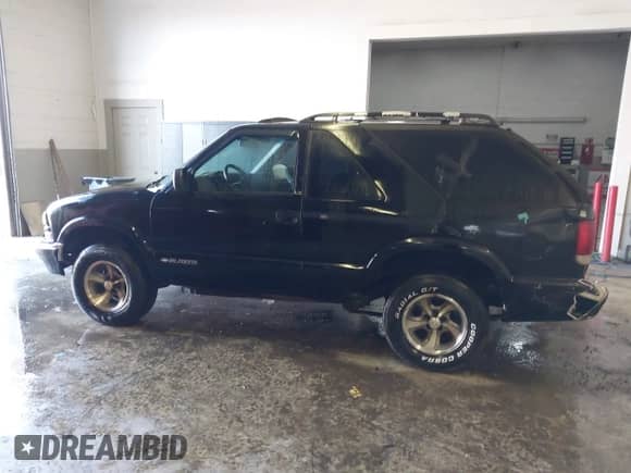2001 Chevrolet Blazer LS with VIN 1GNCS18W51K260297, listed as a IAAI auction lot 41697909 with 144,564 mi miles and . Bid and sale history available at DreamBid. Image 15.