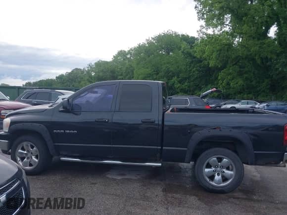 2007 Dodge 1500 SLT z VIN 1D7HU18P67S202084, wystawiony jako IAAI lot #42308989 z przebiegiem 227 266 mil mil oraz . Historia ofert i sprzedaży dostępna na DreamBid. Obrazek 14.