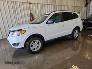 2012 Hyundai Santa Fe GLS с VIN 5XYZGDAB0CG146262, выставлен на аукционе Copart как лот 80094915 с пробегом 139 570 миль миль и Чистый • Clean title. История ставок и продаж доступна на DreamBid. Изображение 1.