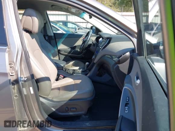 2016 Hyundai Santa Fe with VIN 5XYZUDLA1GG313280, listed as a IAAI auction lot 43119583 with 78,203 mi miles and . Bid and sale history available at DreamBid. Image 5.