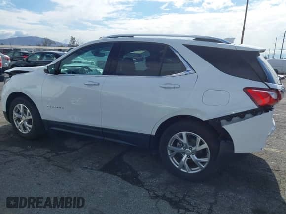 2020 Chevrolet Equinox Premier с VIN 2GNAXXEV6L6215561, выставлен на аукционе IAAI как лот 41345441 с пробегом 54 976 миль миль и . История ставок и продаж доступна на DreamBid. Изображение 14.