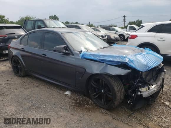 2017 BMW M3 z VIN WBS8M9C50H5G84030, wystawiony jako Copart lot #60248865 z przebiegiem 63 388 mil mil oraz Czysty tytuł • Clean title. Historia ofert i sprzedaży dostępna na DreamBid. Obrazek 4.