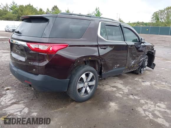2020 Chevrolet Traverse LT with VIN 1GNERHKW0LJ102707, listed as a IAAI auction lot 42274418 with 52,903 mi miles and . Bid and sale history available at DreamBid. Image 4.