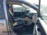 2014 Dodge Grand Caravan SXT with VIN 2C4RDGCG2ER155157, listed as a IAAI auction lot 43513121 with 131,845 mi miles and . Bid and sale history available at DreamBid. Image 5.