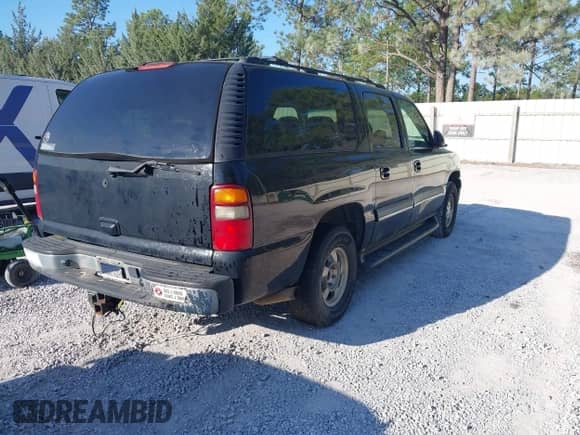 2003 Chevrolet Suburban LS with VIN 1GNEC16T43J221644, listed as a IAAI auction lot 43381885 with 231,154 mi miles and . Bid and sale history available at DreamBid. Image 4.